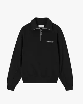 ORIGINS QUARTER ZIP BLACK