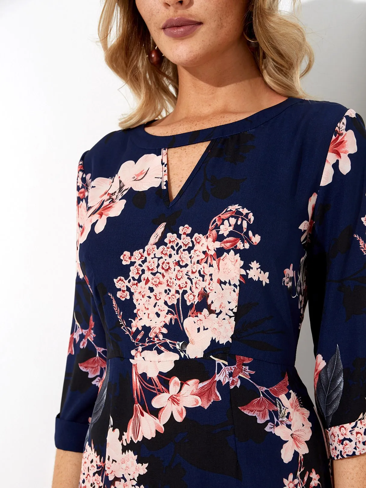 Wholesale Navy Round Neck 3/4 Sleeve Length Floral Print Cut Out Curved Hem Dresses